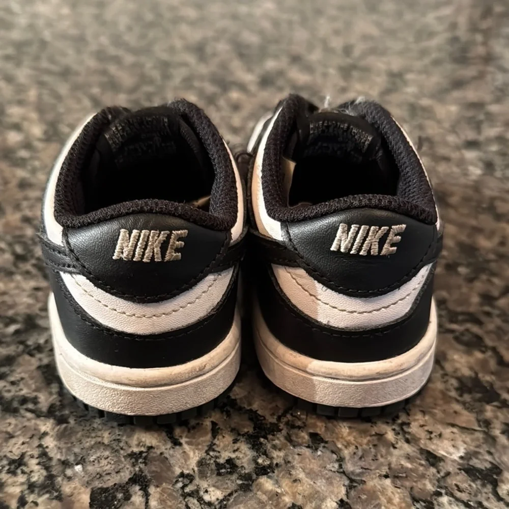 Nike slip on Black and White Sneakers EUC 8.5